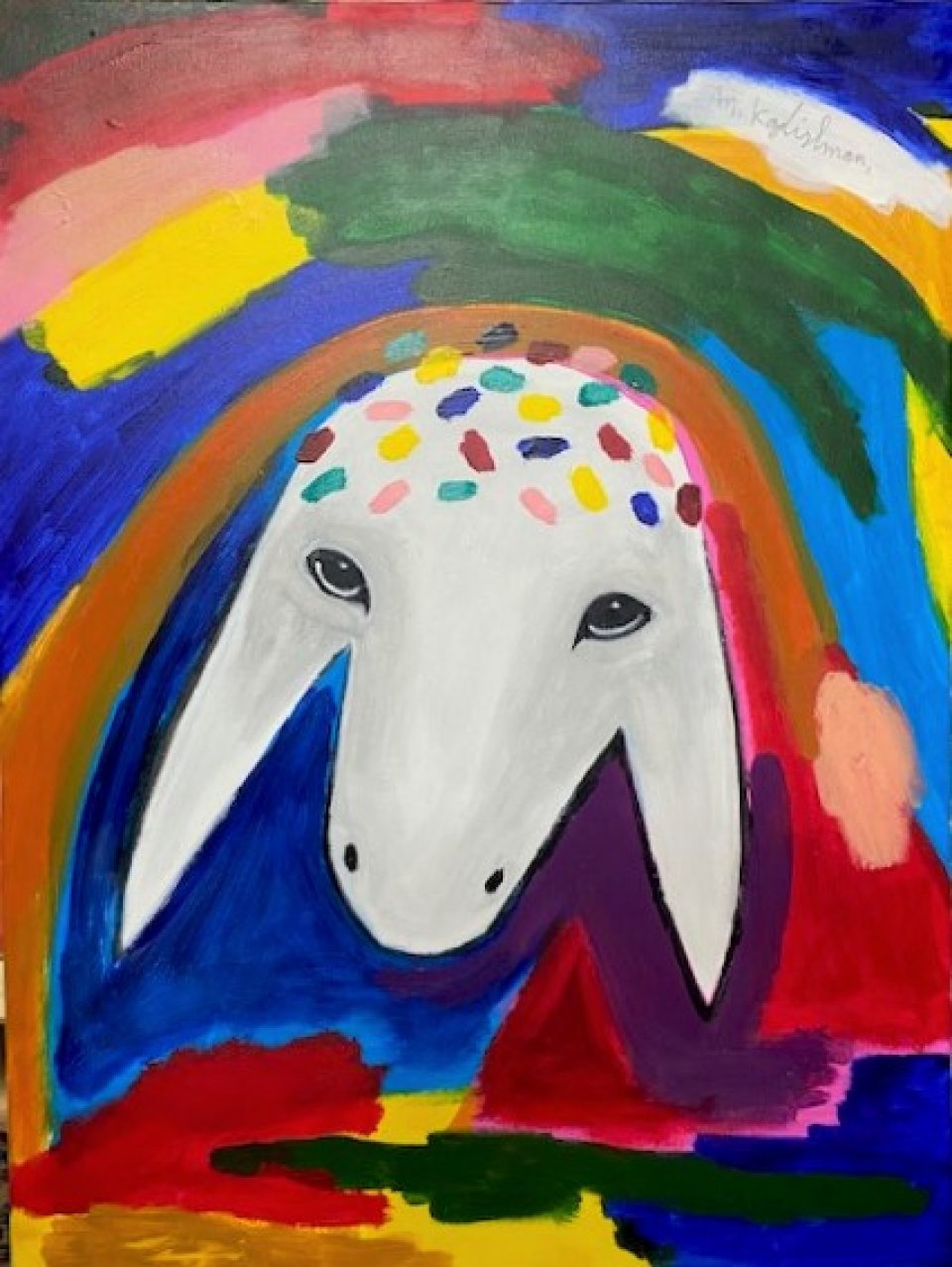 ראש כבשה על רקע צבעוני