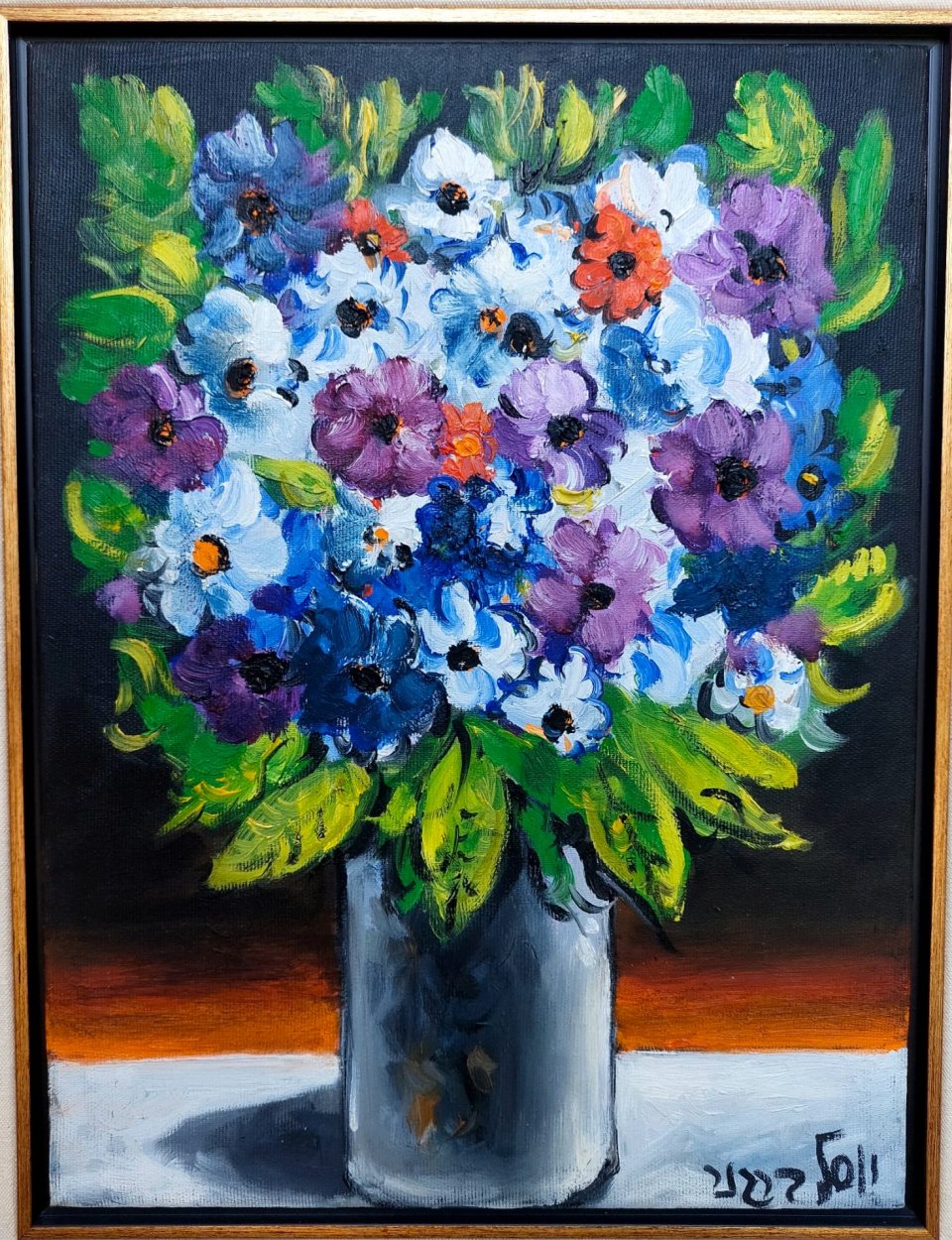 אגרטל עם פרחים צבעוניים